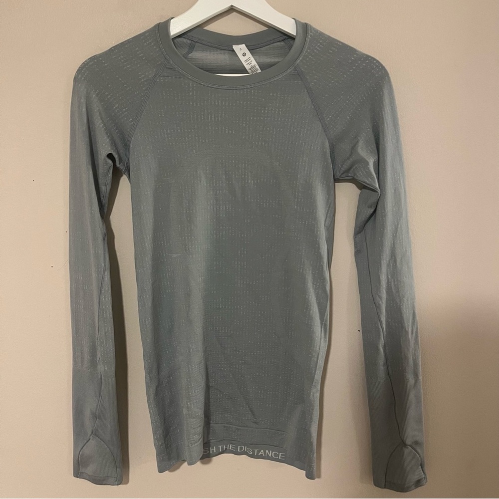 Grey long sleeve swiftly tech, waist length, size 2